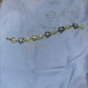 Charming Floral Bracelet with Green Accents